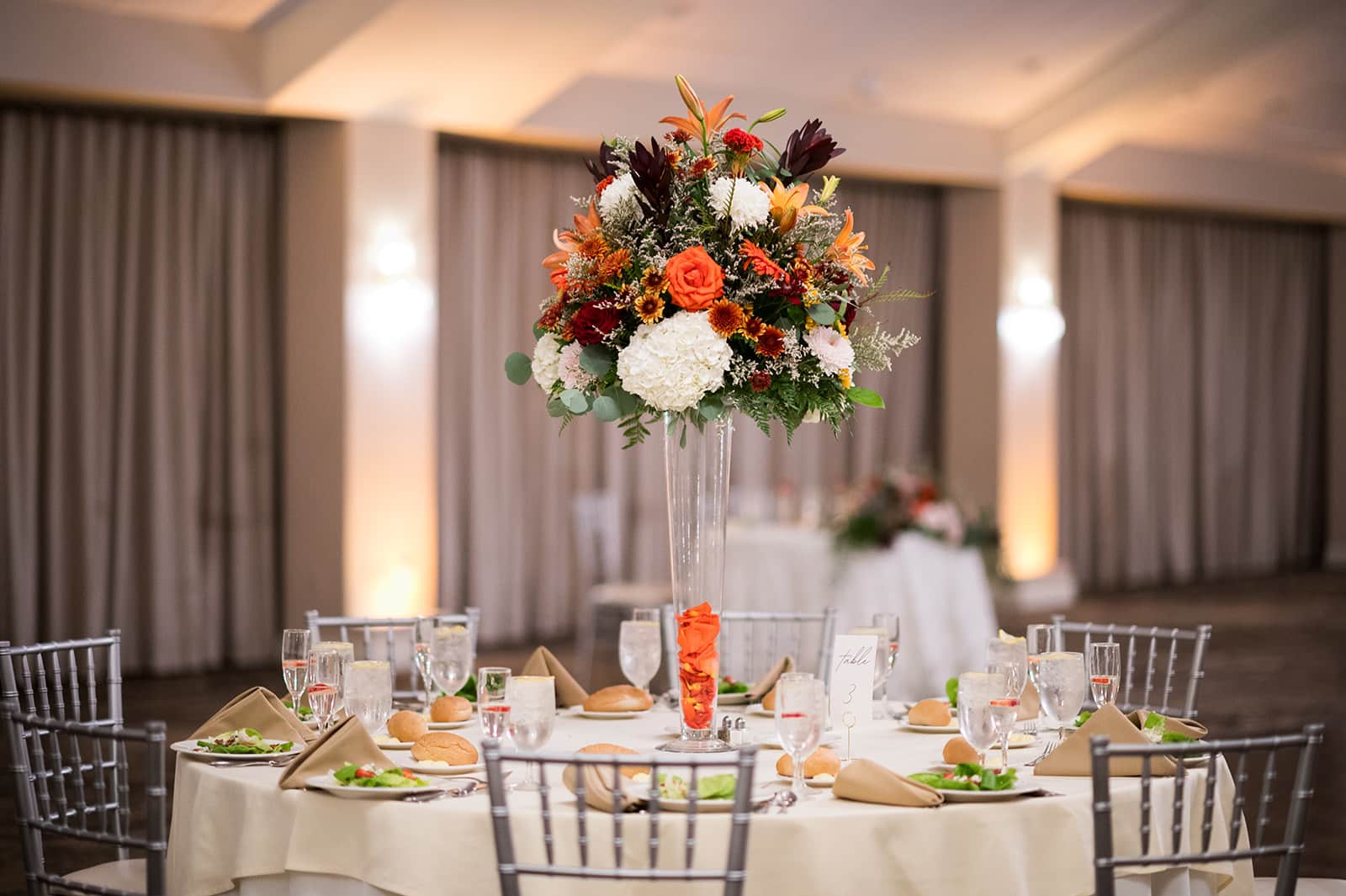 fall floral wedding center piece on table