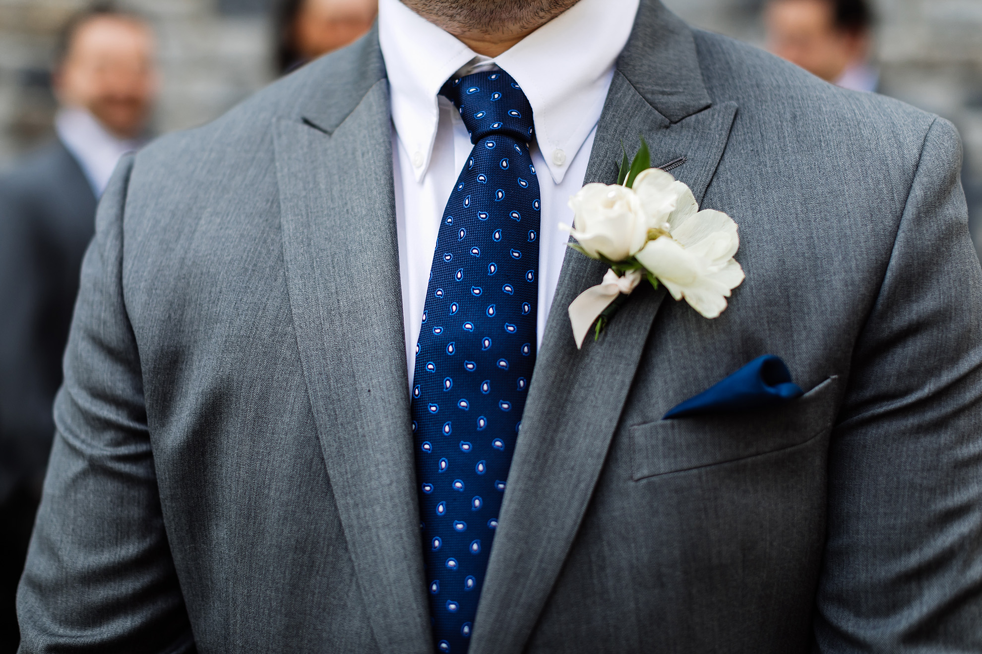Groom with Grey suit, blue tie, boutineer and blue handkerchief.  Photo by Artistic Imagery