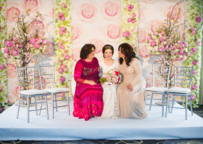Kosher Wedding Bride with two female family members.
