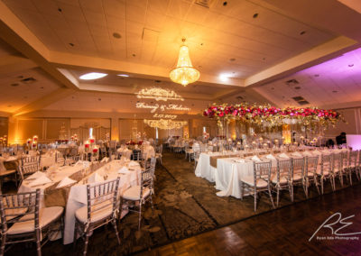 Grand Ballroom in white and gold for wedding reception.
