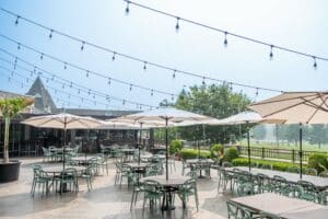 Tavola Restaurant and Bar outdoor patio with umbrella covered tables